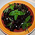 e qualche oliva nera di Ficarra, condita con erbe aromatiche del luogo